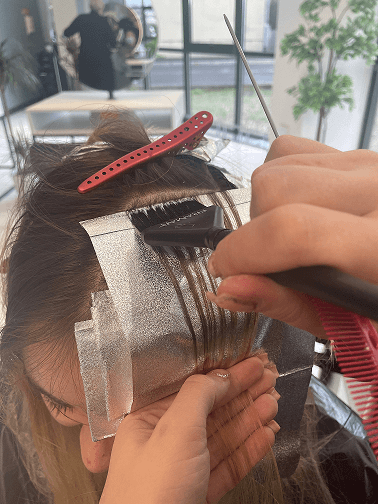 Woman having foil colouring