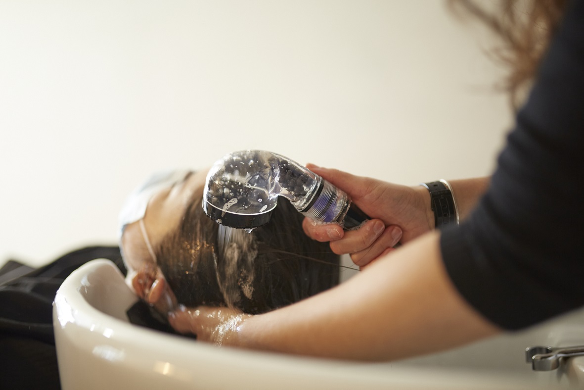 hair being treated and washed