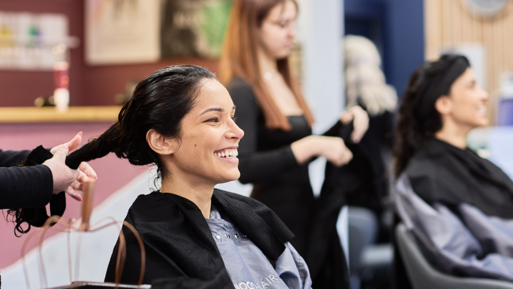 Client enjoying a colour-care treatment at NOCO Hair, part of our Deluxe Treatment Package offer.