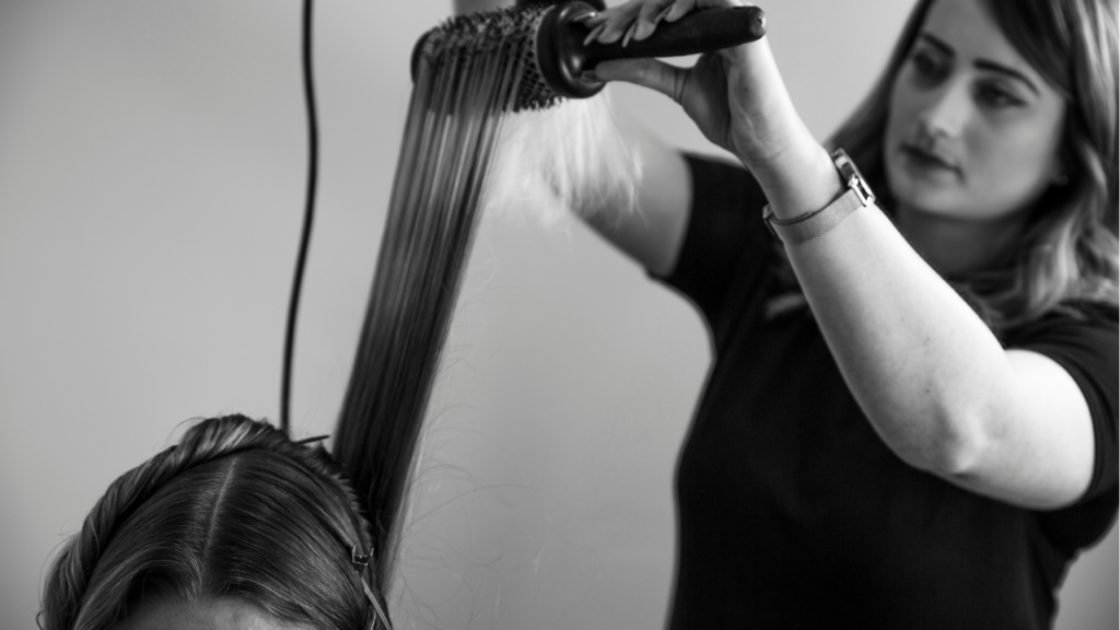 Client receiving a wash and blow dry at NOCO Hair as part of the new guest offer.